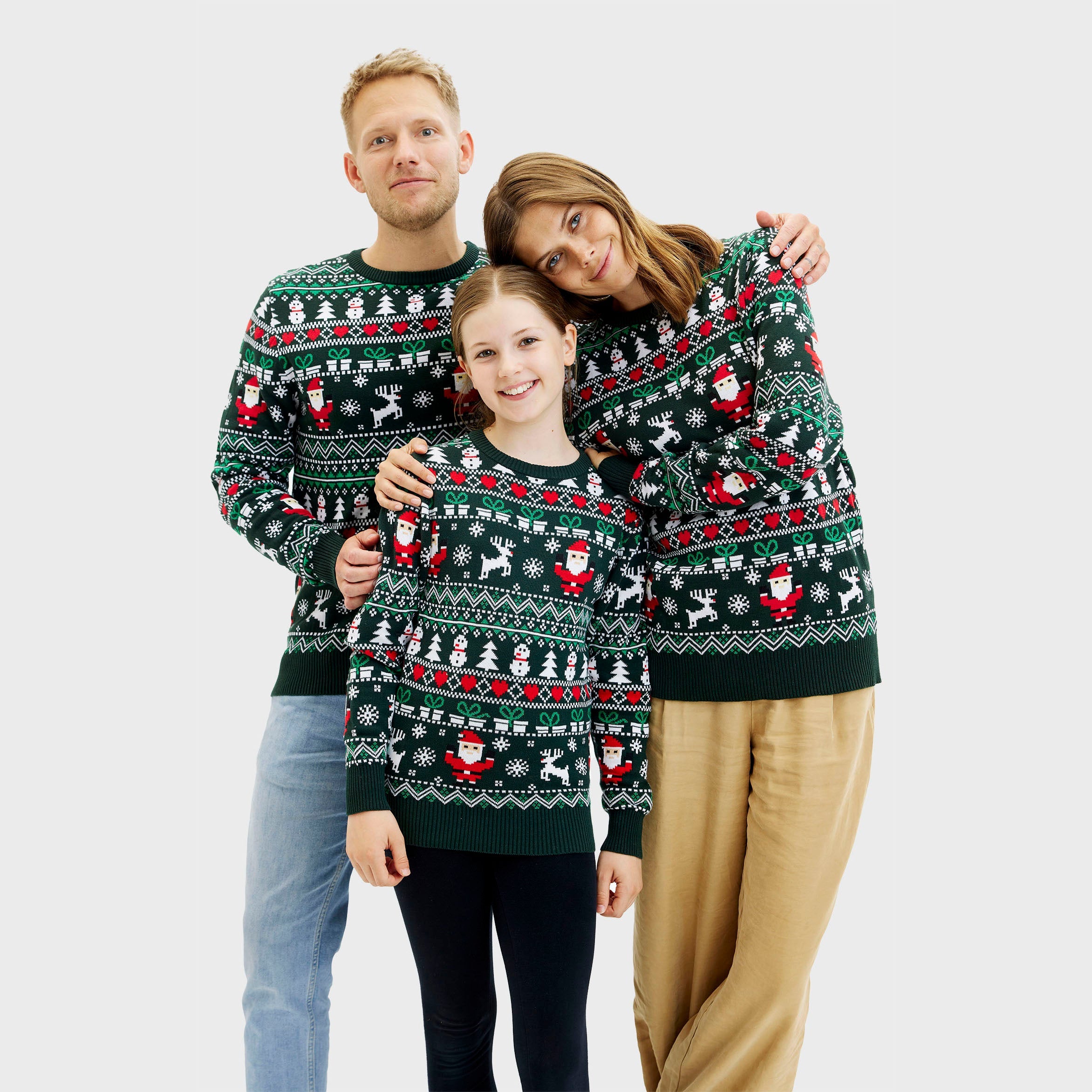 Grüner Weihnachtspullover Herren mit Rentier- und Schneeflockenmuster, nachhaltiger Stoff.