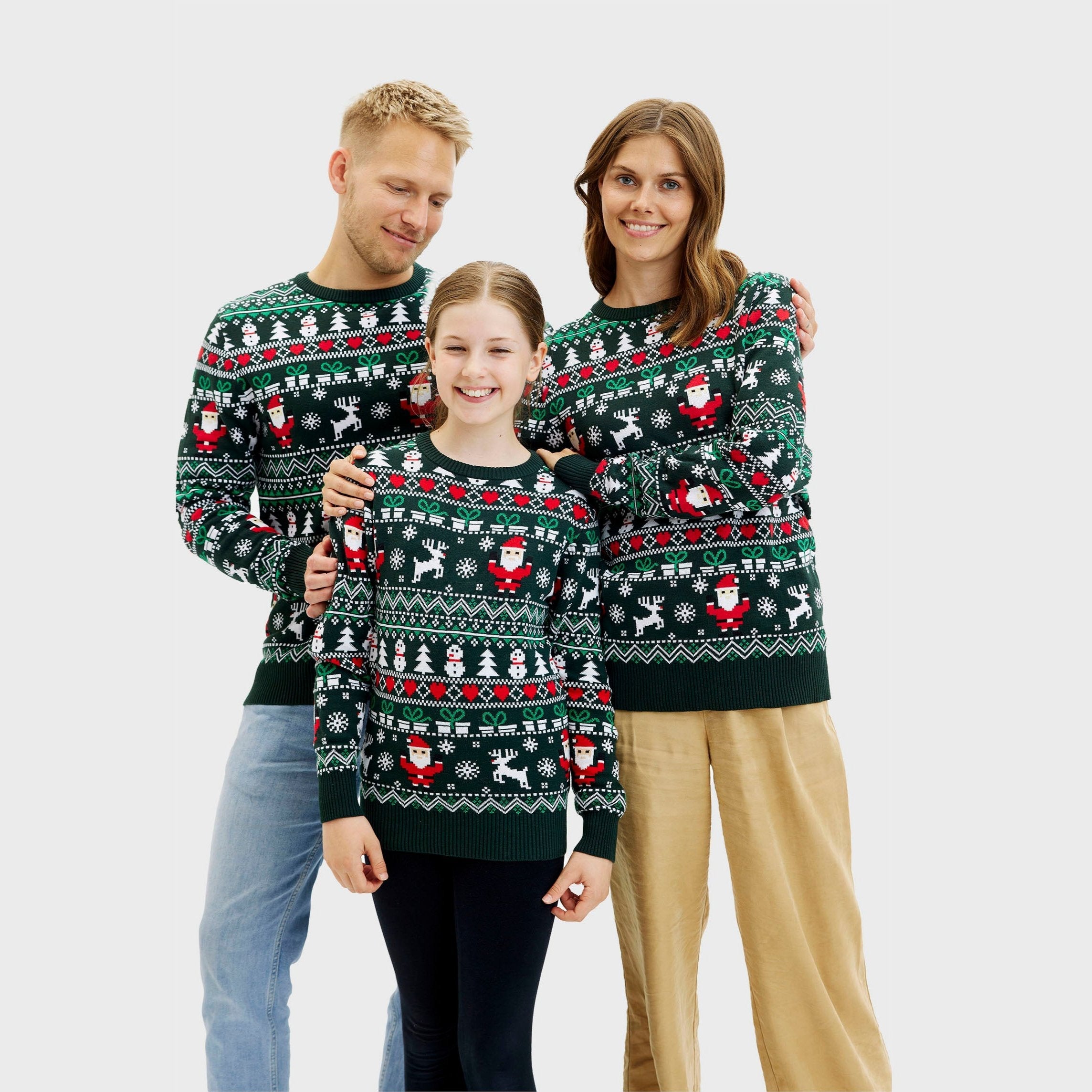Grüner Weihnachtspullover Damen Herren Kinder mit klassischen Weihnachtsmotiven und Norwegermuster.