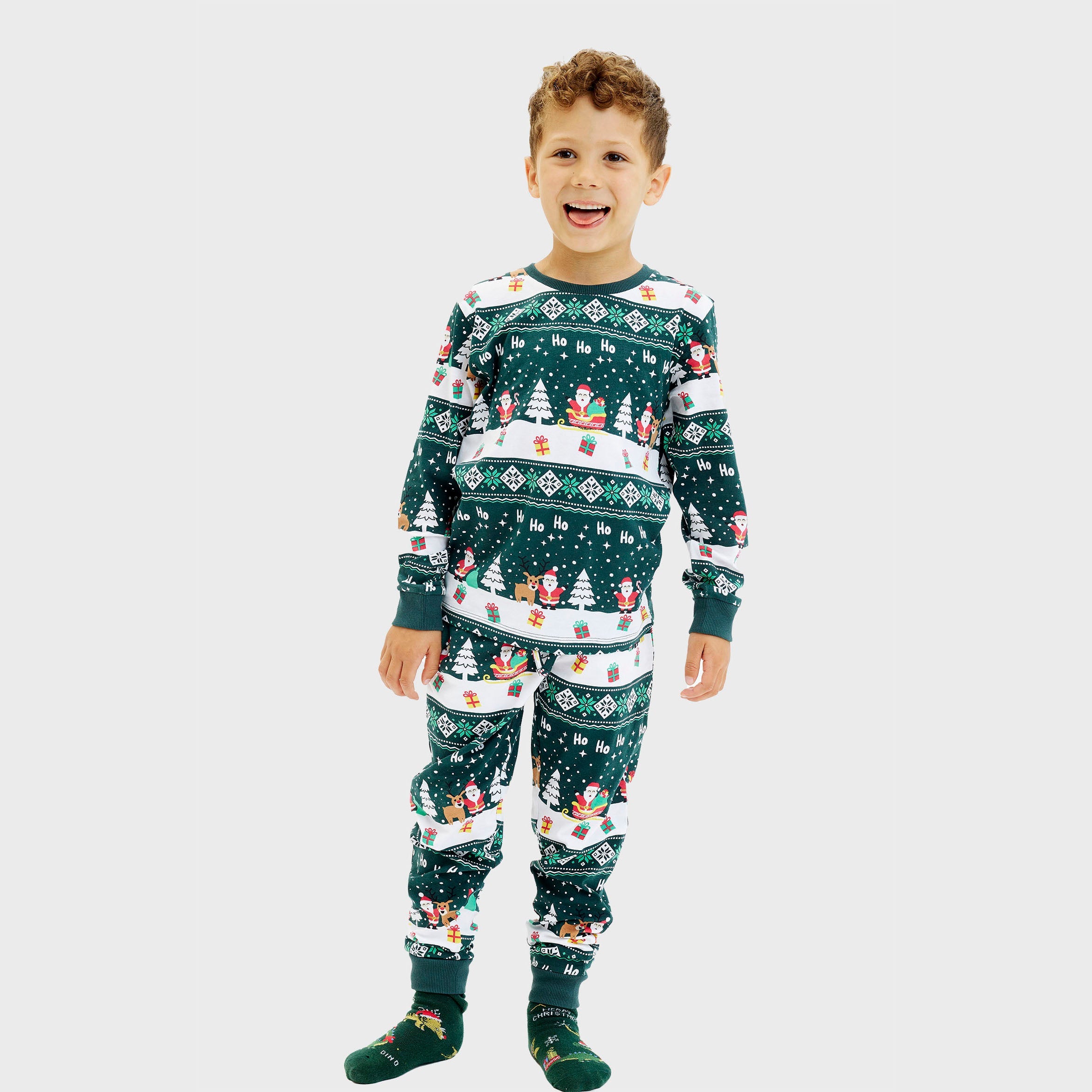 Kinder Weihnachtspyjama mit grünem Weihnachtsmuster, Schneemännern und Rentieren, langärmlig.