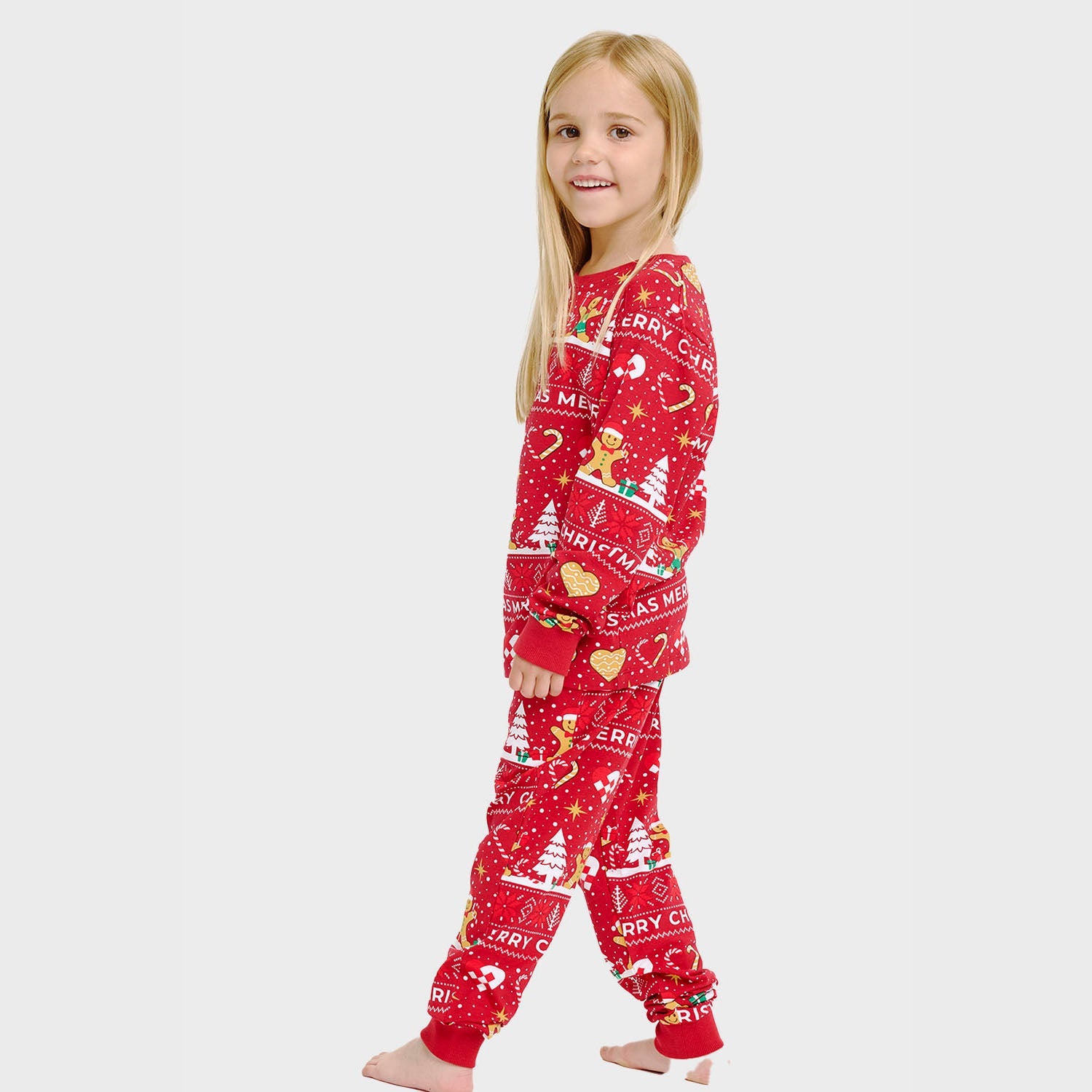Roter Weihnachtskeks Julepyjama Kinder, weihnachtspyjama aus GOTS-Bio-Baumwolle mit festlichem Muster.