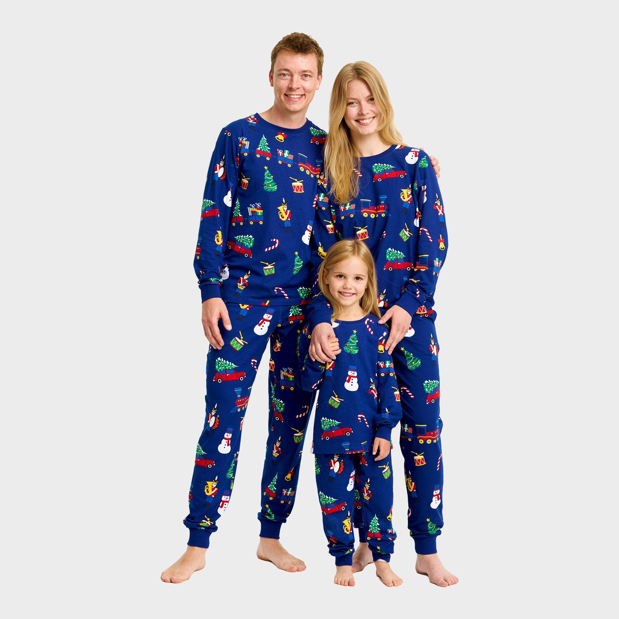 Familien-Weihnachtspyjama aus Bio-Baumwolle mit buntem Spielzeug- und Schneemann-Motiv, Unisex für Damen, Herren und Kinder.
