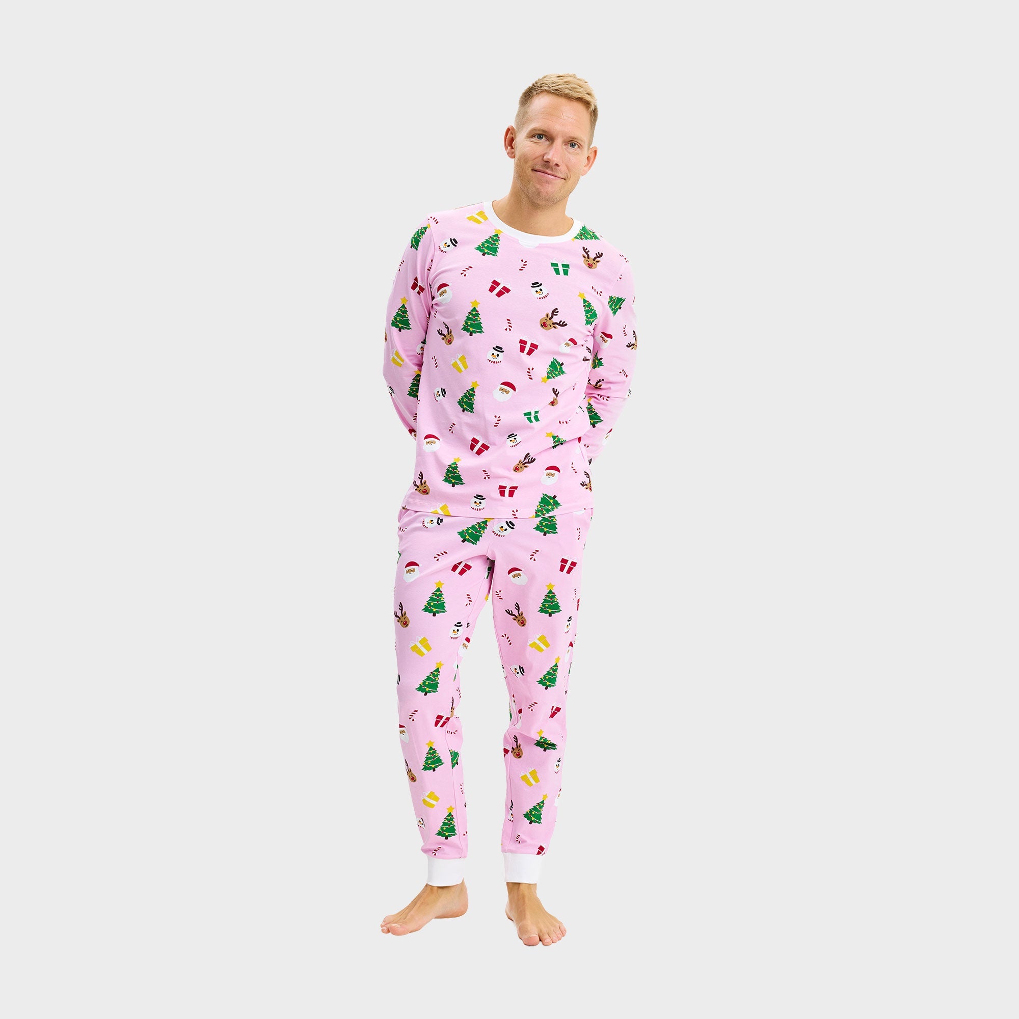 Herren Weihnachtspyjama in Rosa mit festlichem Print und weihnachtspullover Stil.